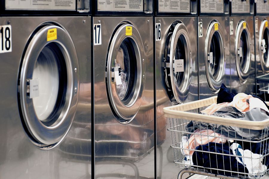 commercial laundry machine with clothes